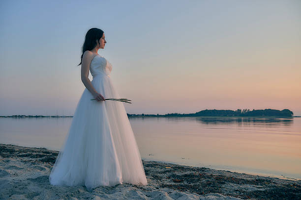 7 Unique Beach Wedding Dresses That Will Leave Your Guests Speechless